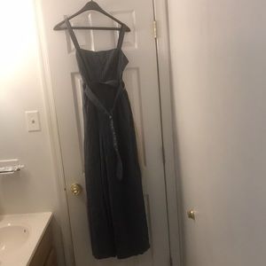 Gray/blue striped jumpsuit with belt.